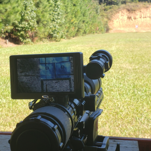 An rifle scope clip-on that lets you see your scope's crosshairs on a rail mounted display in real time.