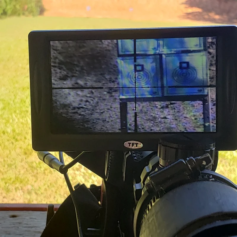 Adaptive rifle scope for low vision and assisted blind shooting sports and hunting showing targets on display at 100 yards - Digital Crosshairs 1000SA